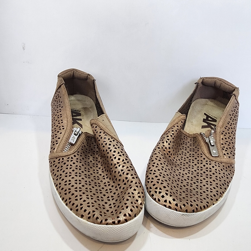 AK sport by Anne Klein Gold Slip ons